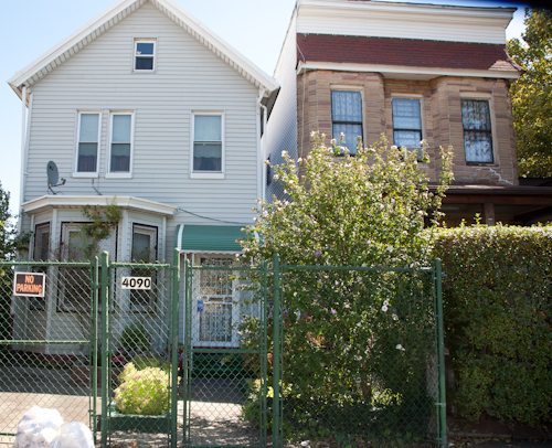 Houses on 175th St. just a few steps from the Cross-Bronx Expressway. Photo by Pat Arnow