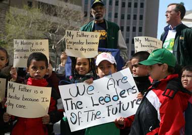 As District Council 1707 Executive Director Raglan George addresses union rally in City Hall Park April 16, some younger participants offer testimony as to how the city's day-care services affect their families. (04.25.08)