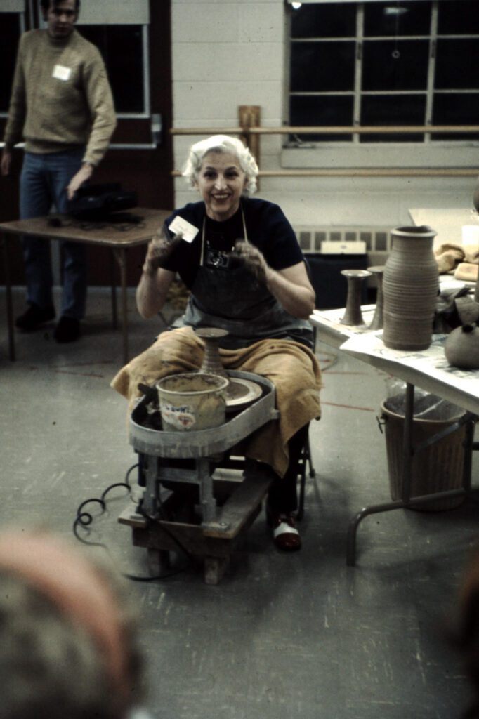 Edna demonstrating how to throw a pot in 1973.