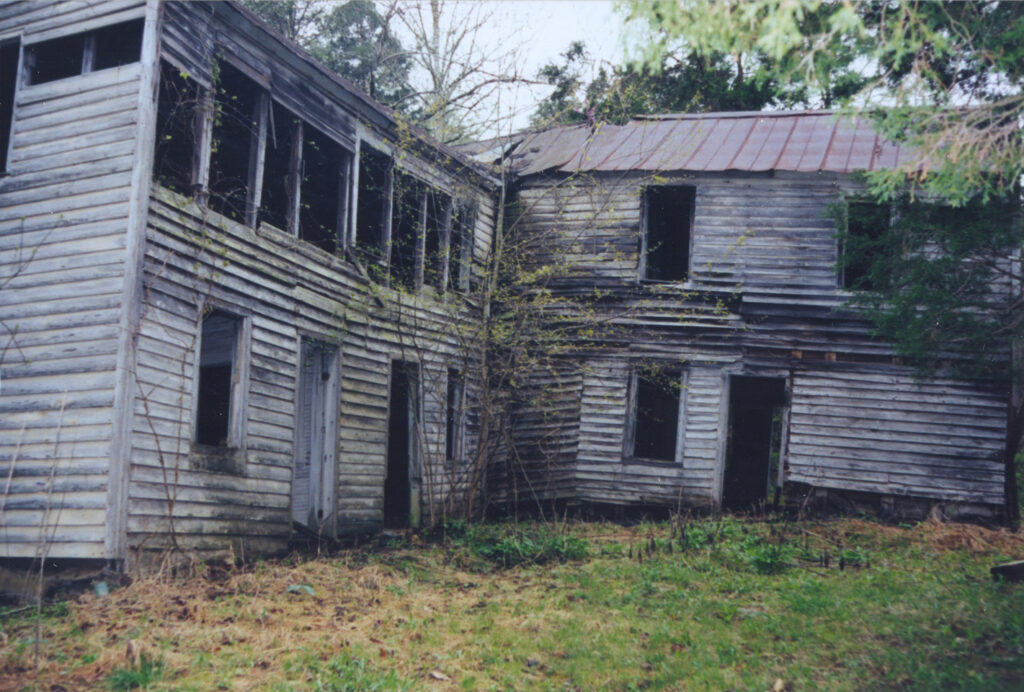 Farmhouse and land that became the Arnow farm in Pulaski County, Ky. The land was cleared but has now grown up into woodland.